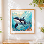 Finished realistic orca in the ocean cross stitch artwork displayed