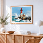 Red and white lighthouse cross stitch artwork displayed on wall as home decor