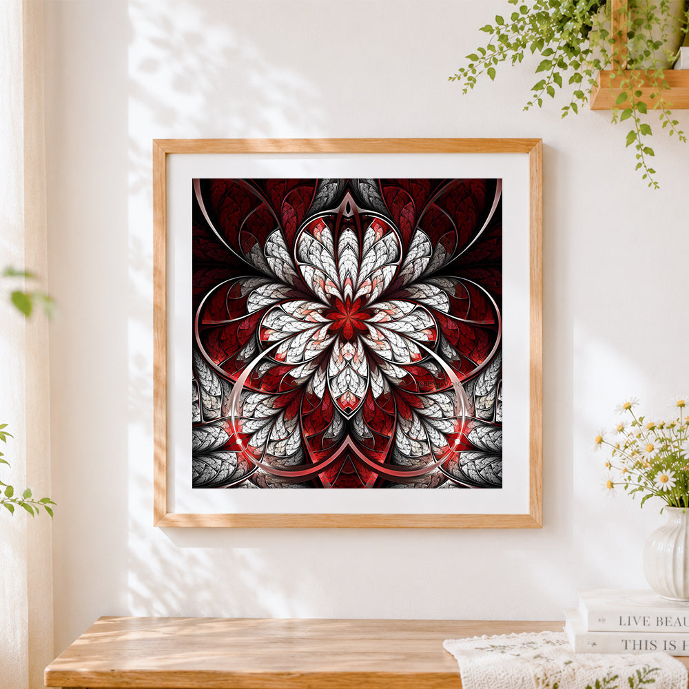 Finished red and white symmetrical mandala cross stitch artwork displayed