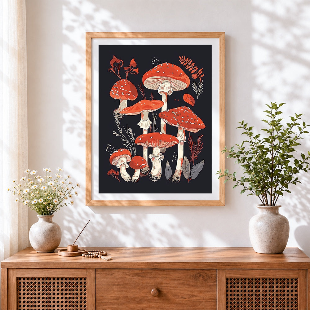 Finished red and white toadstools cross stitch artwork displayed