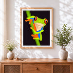 Finished red eyed tree frog on a branch cross stitch artwork displayed