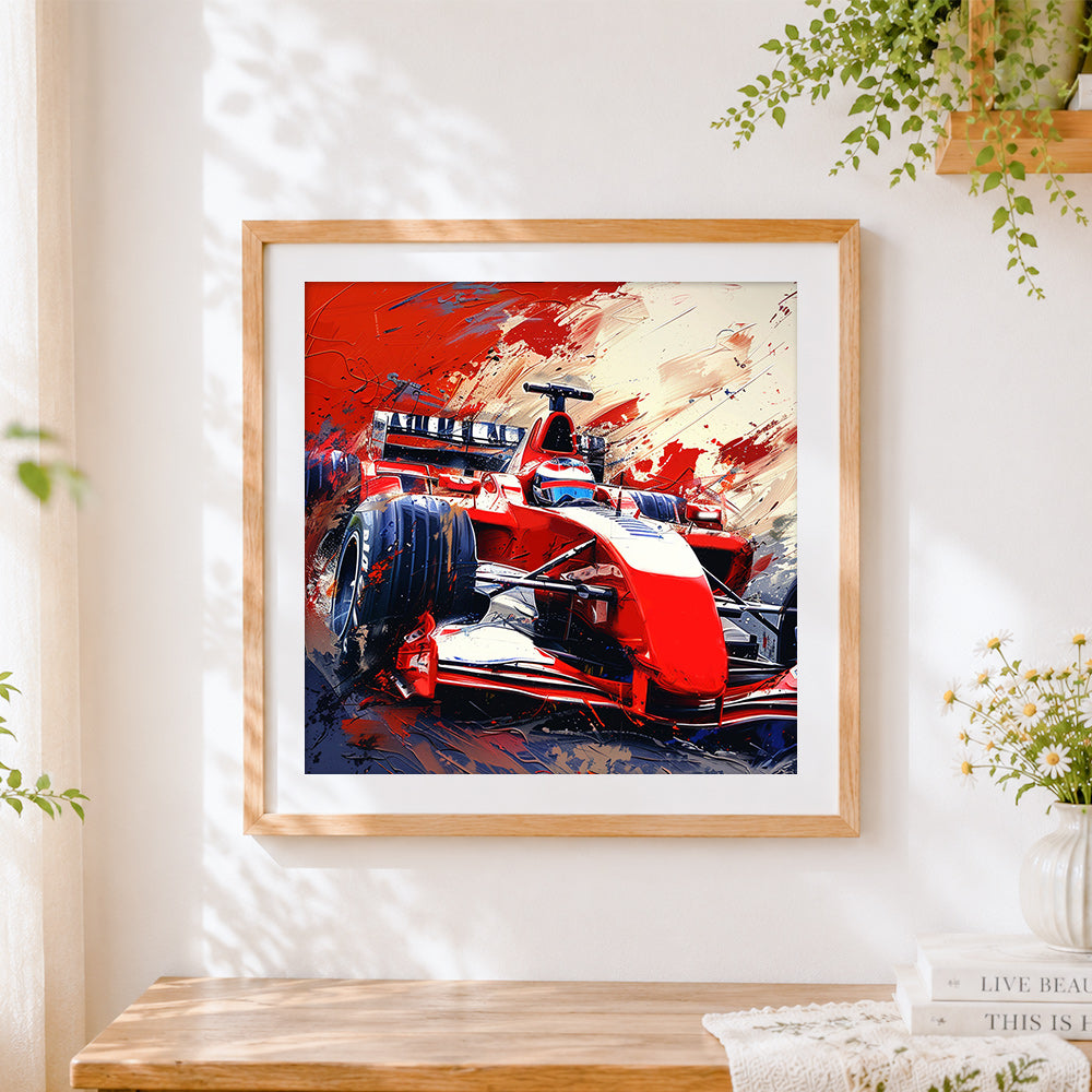 Finished red formula 1 racing car cross stitch artwork displayed