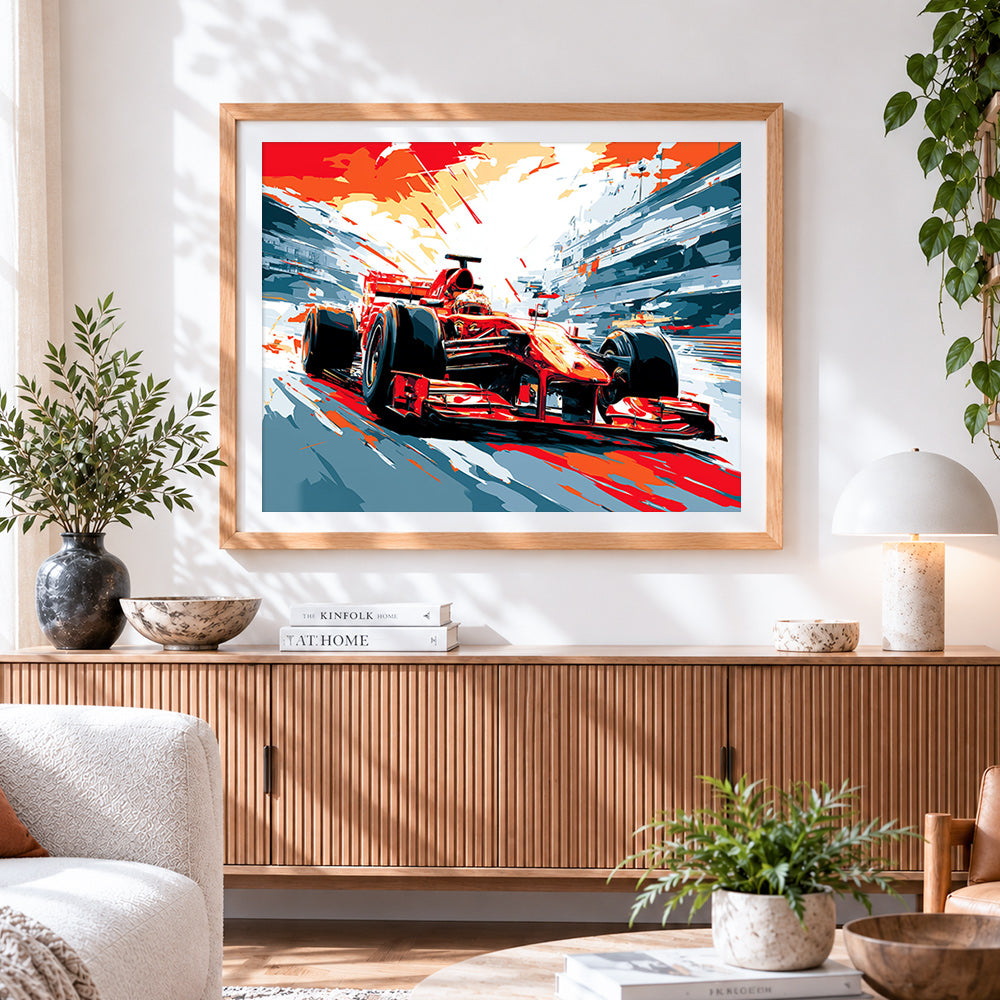 Finished red racing car cross stitch artwork displayed