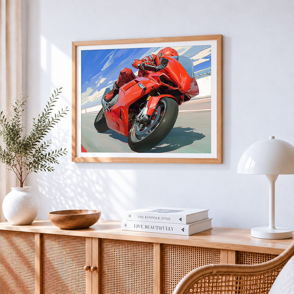 Red racing motorcycle cross stitch artwork displayed on wall as home decor