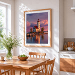 Red roof lighthouse at sunset cross stitch artwork displayed on wall as home decor