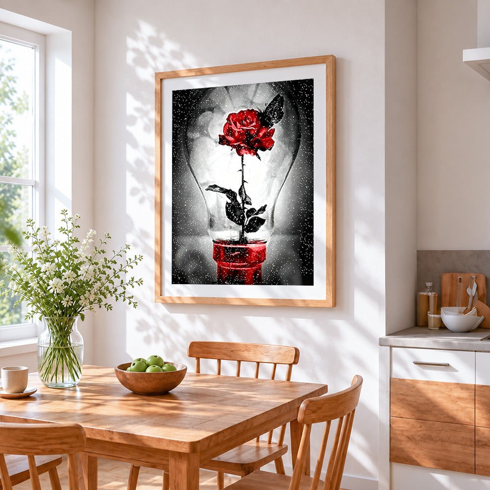 Red rose in lightbulb with butterfly cross stitch artwork displayed on wall as home decor