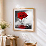 Red rose with water splash paint by numbers artwork displayed on wall as home decor
