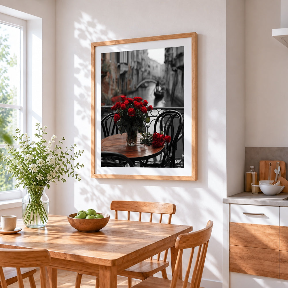 Red roses on a venice cafe table cross stitch artwork displayed on wall as home decor