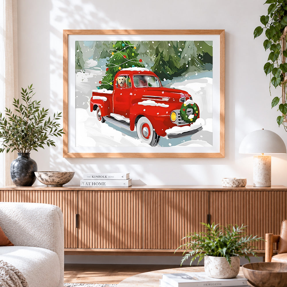 Finished red truck with christmas tree cross stitch artwork displayed