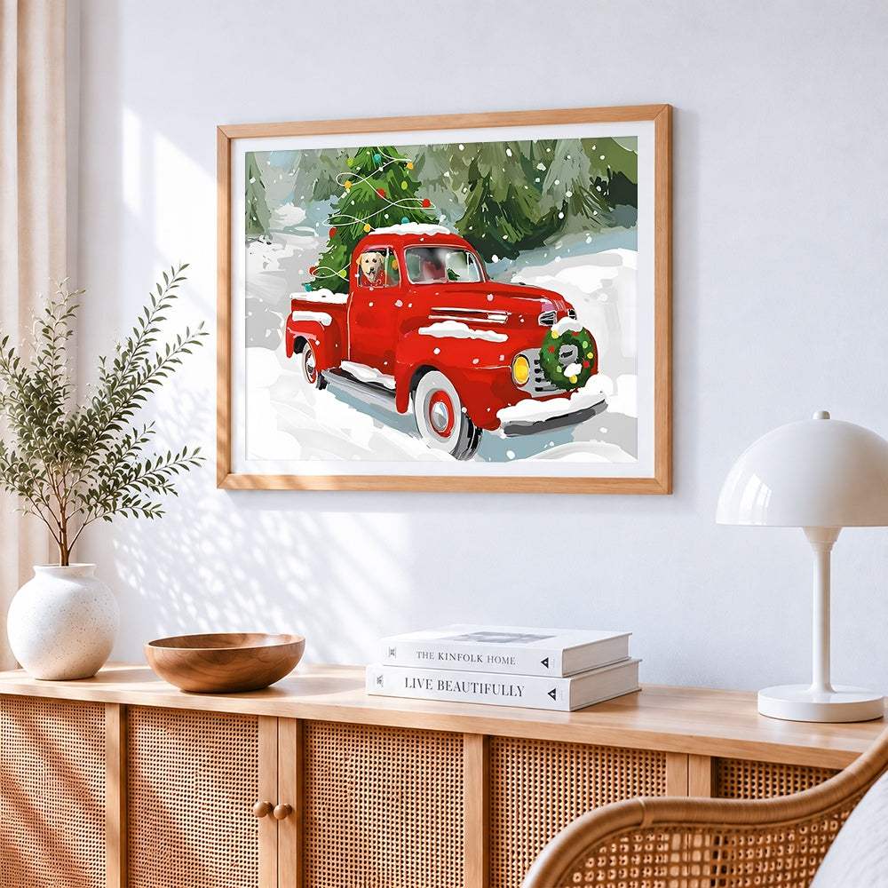 Red truck with christmas tree cross stitch artwork displayed on wall as home decor