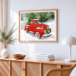 Red truck with christmas tree cross stitch artwork displayed on wall as home decor