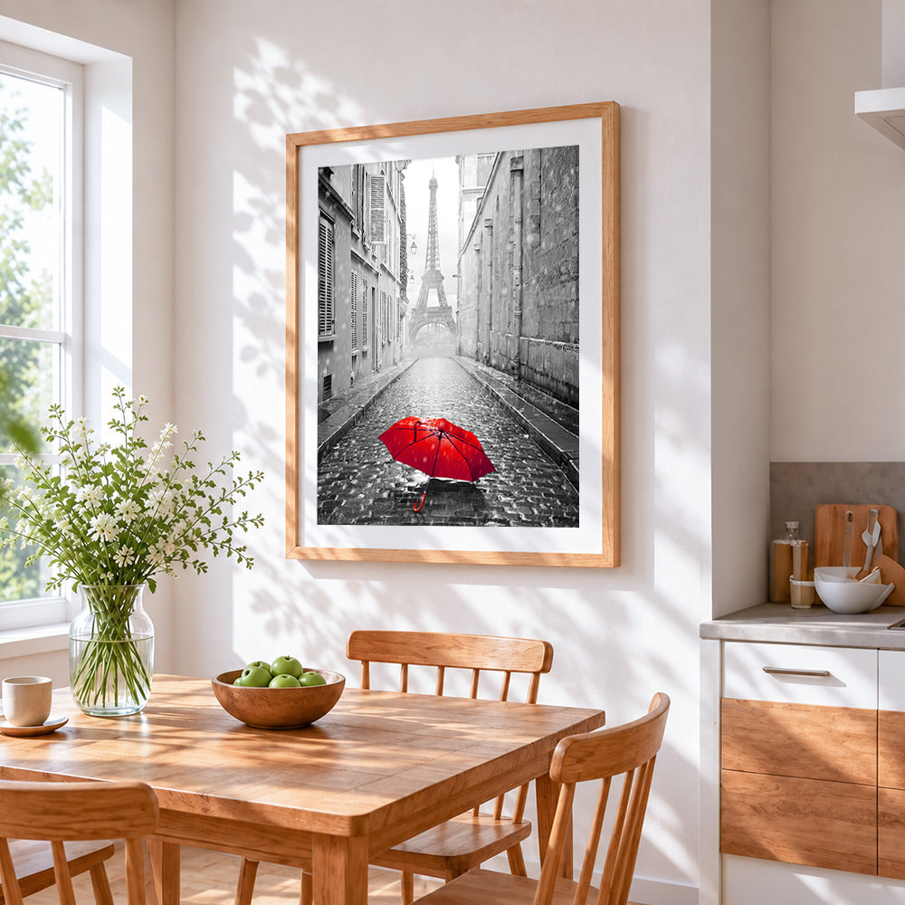 Red umbrella in paris cross stitch artwork displayed on wall as home decor