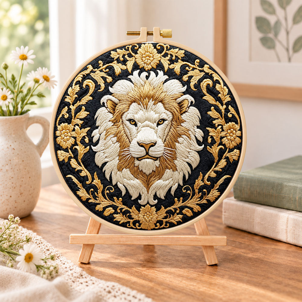 Regal golden lion embroidery kit finished hoop displayed on a wooden stand as cosy tabletop decor