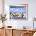 Relaxing porch with ocean view cross stitch artwork displayed on wall as home decor