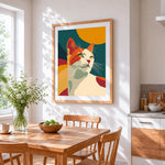 Retro orange and white cat cross stitch artwork displayed on wall as home decor