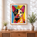 Finished retro pop art cat portrait cross stitch artwork displayed
