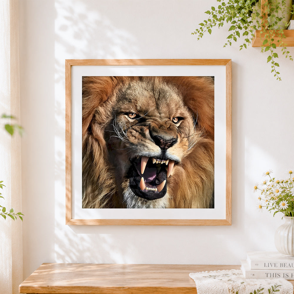 Finished roaring lion close-up cross stitch artwork displayed