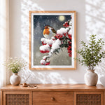Finished robin in snow cross stitch artwork displayed
