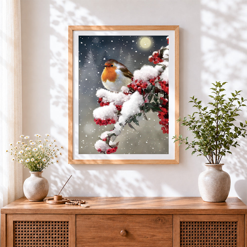 Finished robin in snow cross stitch artwork displayed