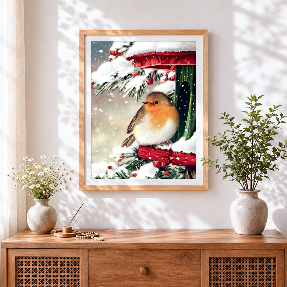Finished robin on a snowy bird feeder paint by numbers artwork displayed as home decor