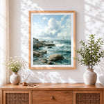 Finished rocky shore and sailing boats cross stitch artwork displayed