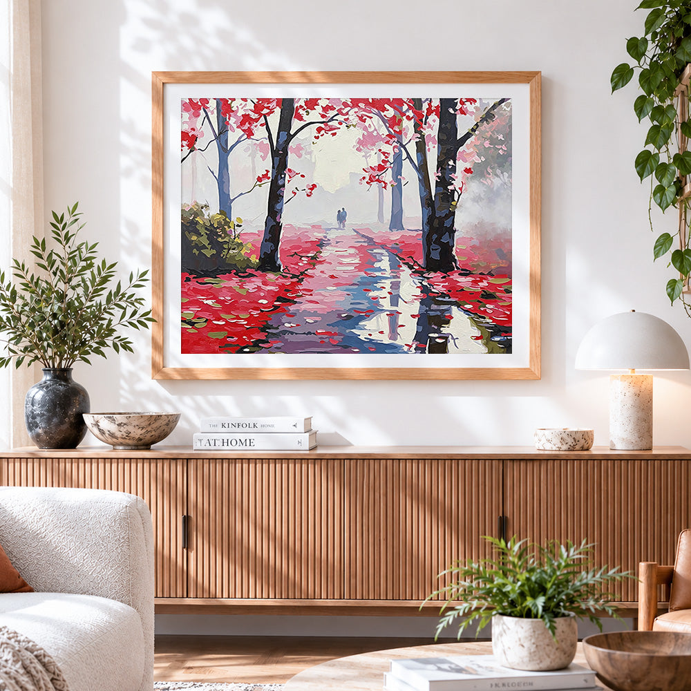 Finished romantic couple in pink blossom forest cross stitch artwork displayed