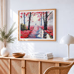 Romantic couple in pink blossom forest cross stitch artwork displayed on wall as home decor
