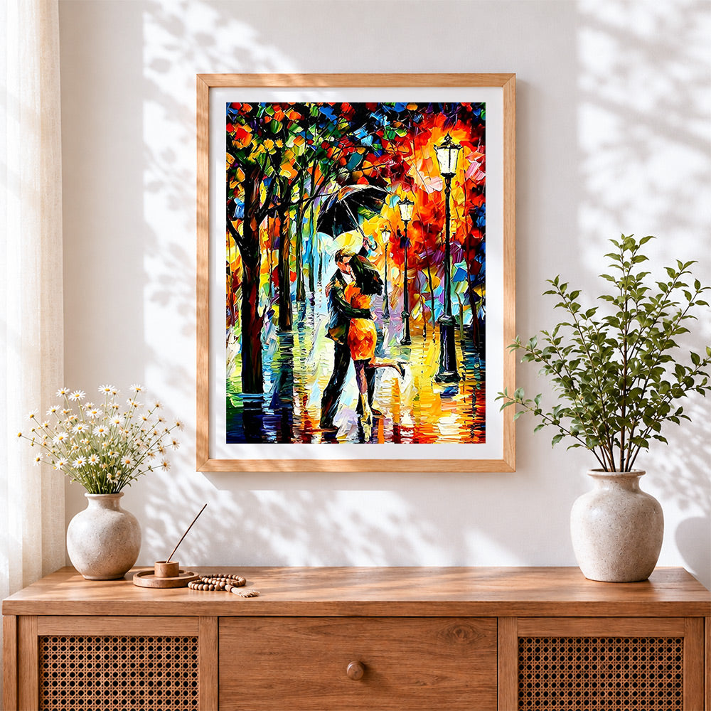 Finished romantic couple kissing in rain cross stitch artwork displayed