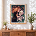 Finished romantic girl with skeleton cross stitch artwork displayed