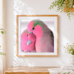 Finished romantic parrots cross stitch artwork displayed