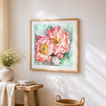 Romantic pink peonies cross stitch artwork displayed on wall as home decor