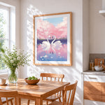 Romantic swans and cherry blossom cross stitch artwork displayed on wall as home decor