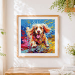 Finished running cocker spaniel cross stitch artwork displayed