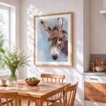 Rustic donkey cross stitch artwork displayed on wall as home decor