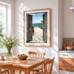 Rustic doors opening to turquoise beach cross stitch artwork displayed on wall as home decor