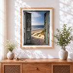Finished rustic doors to sandy beach cross stitch artwork displayed