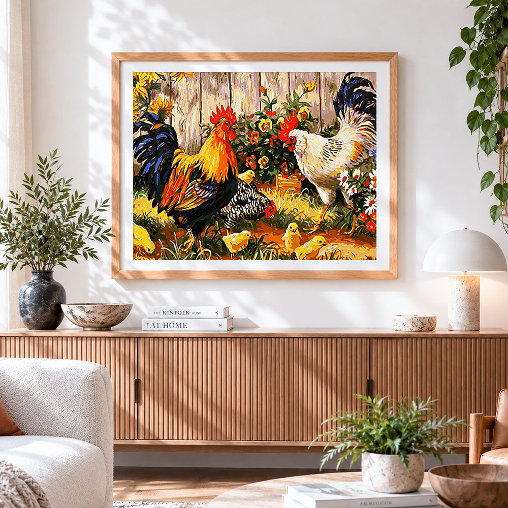 Finished rustic farmyard rooster, hen and chicks cross stitch artwork displayed