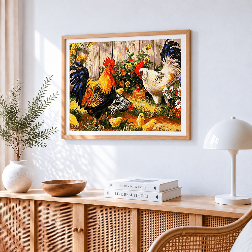 Rustic farmyard rooster, hen and chicks cross stitch artwork displayed on wall as home decor
