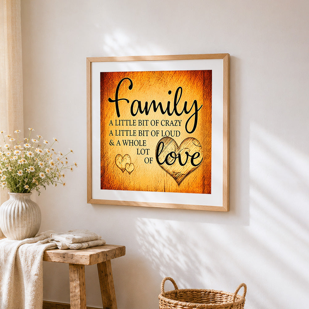 Rustic golden family quote cross stitch artwork displayed on wall as home decor