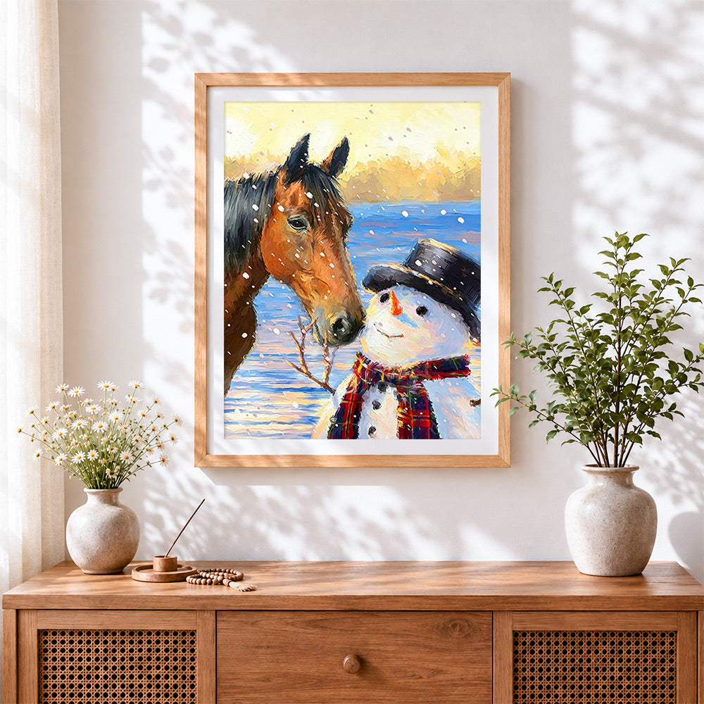 Finished rustic horse and snowman cross stitch artwork displayed