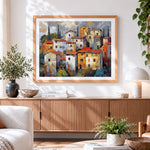 Finished rustic houses cross stitch artwork displayed