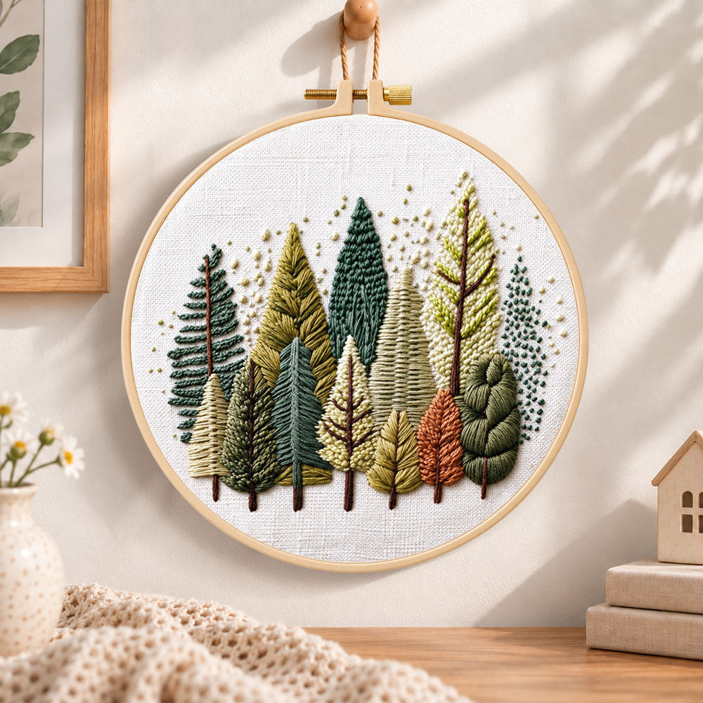 Rustic pine tree grove embroidery hoop wall art displayed as warm and cosy handmade home decor