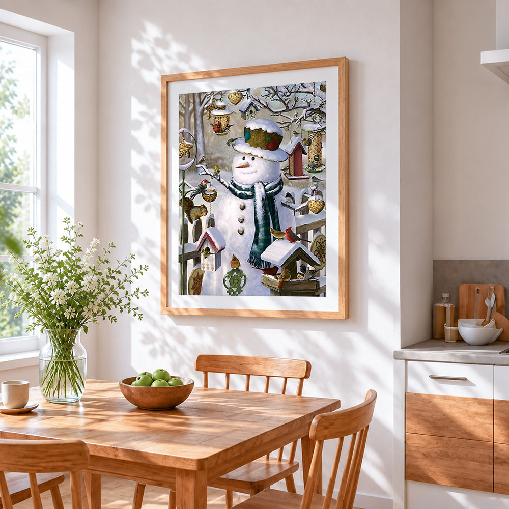 Rustic snowman and bird feeder cross stitch artwork displayed on wall as home decor