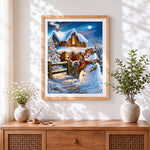 Finished rustic snowman by a cosy log cabin cross stitch artwork displayed