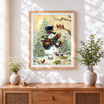 Finished rustic snowman feeding winter birds cross stitch artwork displayed