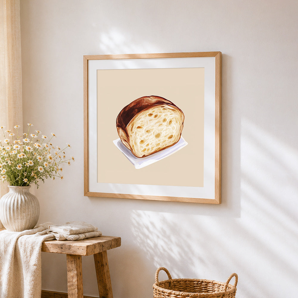 Rustic sourdough bread slice cross stitch artwork displayed on wall as home decor