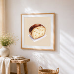 Rustic sourdough bread slice cross stitch artwork displayed on wall as home decor