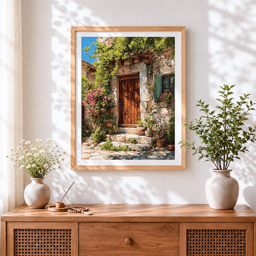 Finished rustic stone cottage door and bougainvillea cross stitch artwork displayed