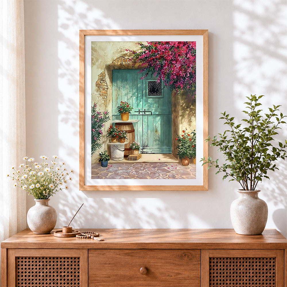 Finished rustic teal door and blossoms cross stitch artwork displayed