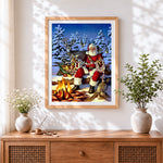 Finished rustic woodland santa and animals cross stitch artwork displayed